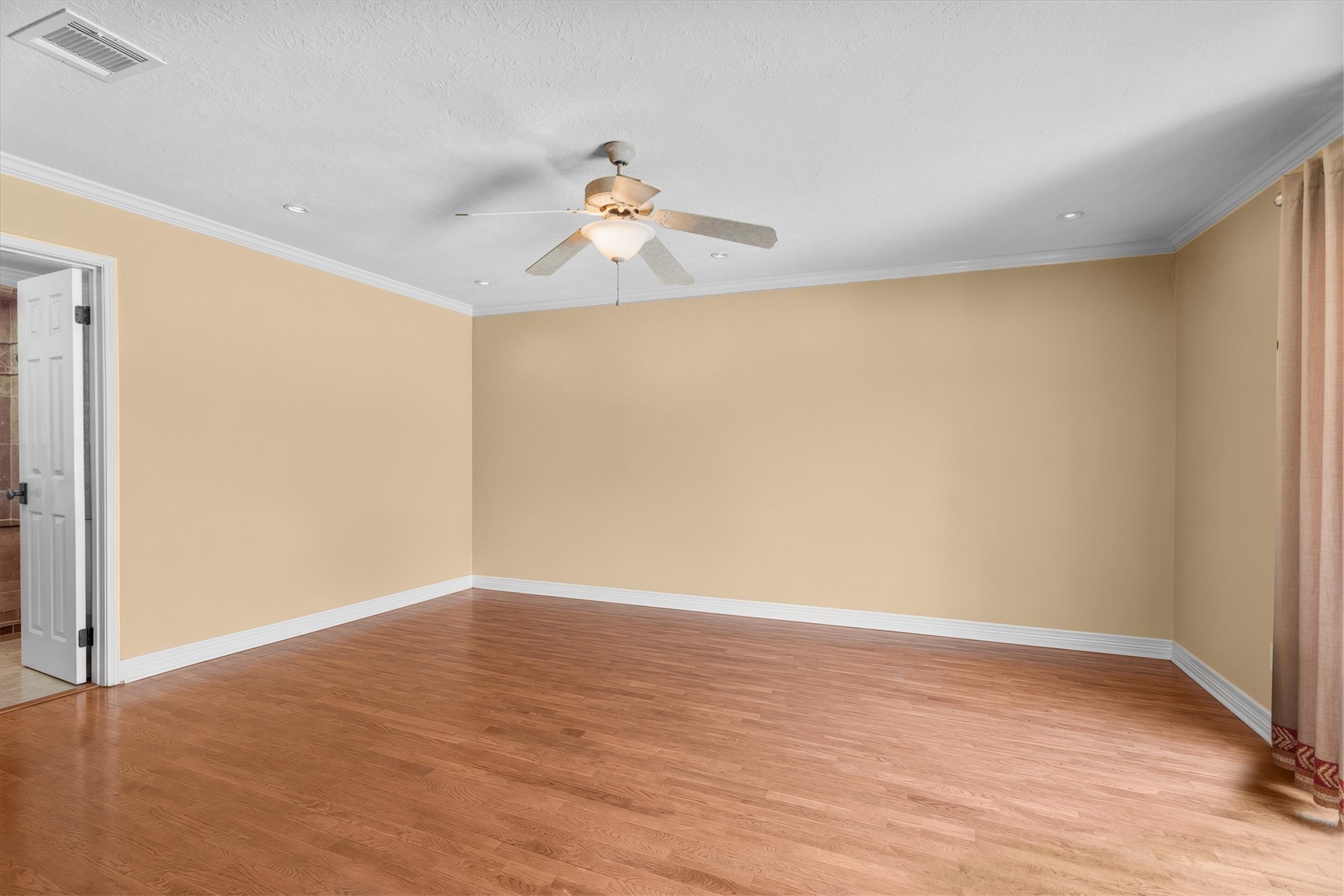 9103 Herts Road Spring, TX 77379 - Photo 23 of 46 A virtually-staged view of the primary bedroom showcases the move-in ready space.