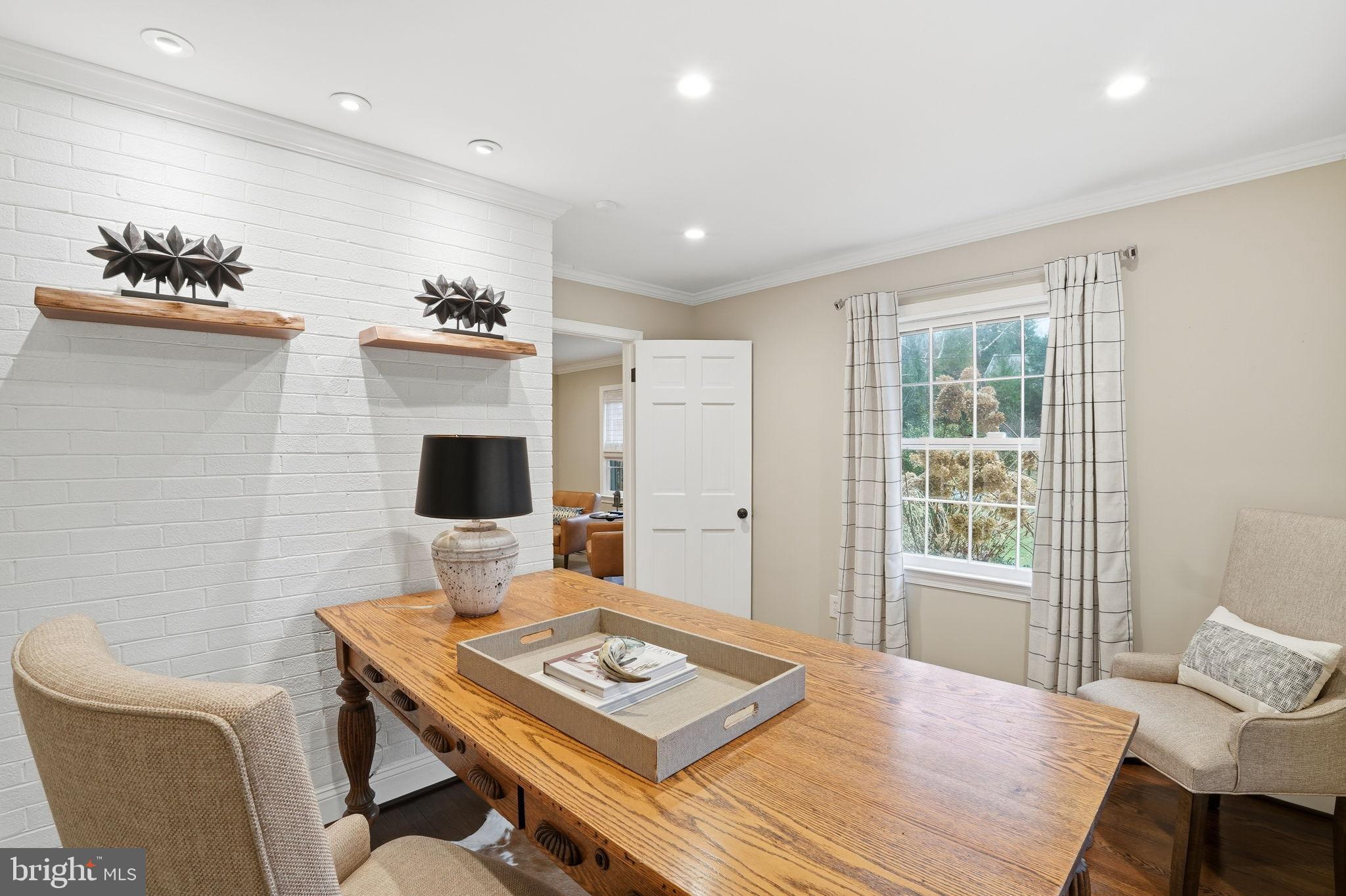 8436 Burning Tree Road Bethesda, MD 20817 - Photo 15 of 34 a workspace with furniture and a window