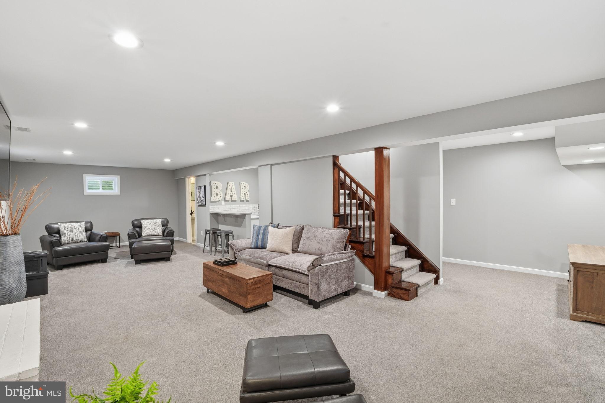 8436 Burning Tree Road Bethesda, MD 20817 - Photo 26 of 34 a living room with furniture and a window