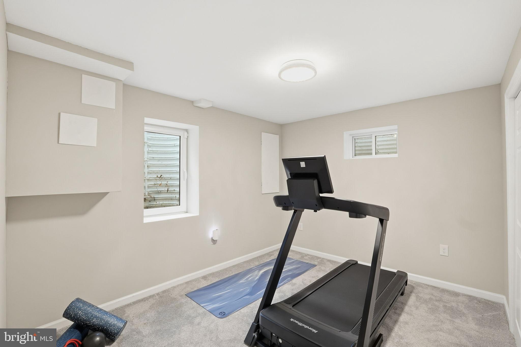 8436 Burning Tree Road Bethesda, MD 20817 - Photo 28 of 34 a view of a room with gym equipment