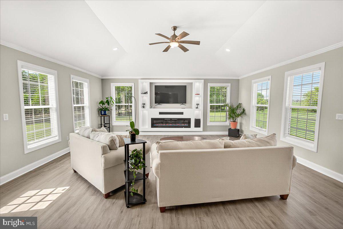 10042 Roulette Drive Hagerstown, MD 21740 - Photo 2 of 51 a living room with furniture and a flat screen tv