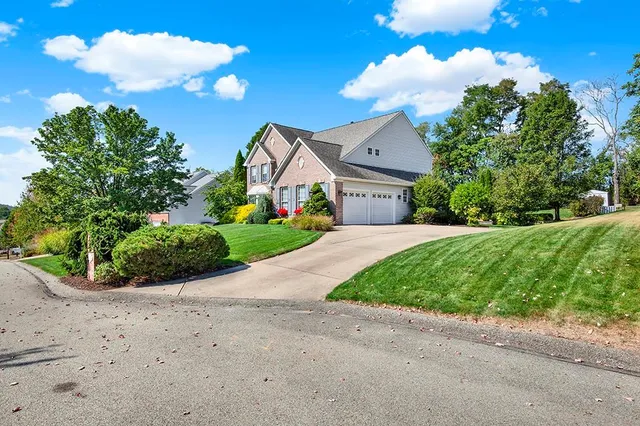 a view of house with garden