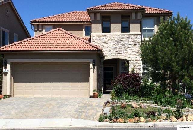 591 Needles Court Reno, NV 89521 - Photo 1 of 1 a front view of a house with garage