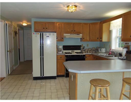 28 Logan Ridge Road Chelsea, ME 04330 - Photo 7 of 25 Kitchen. Step-saving kitchen