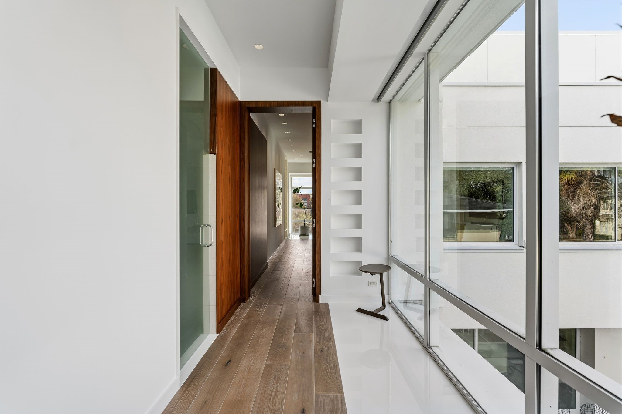 1509 Banks Street Houston, TX 77006 - Photo 21 of 40 a view of a hallway with wooden floor and staircase