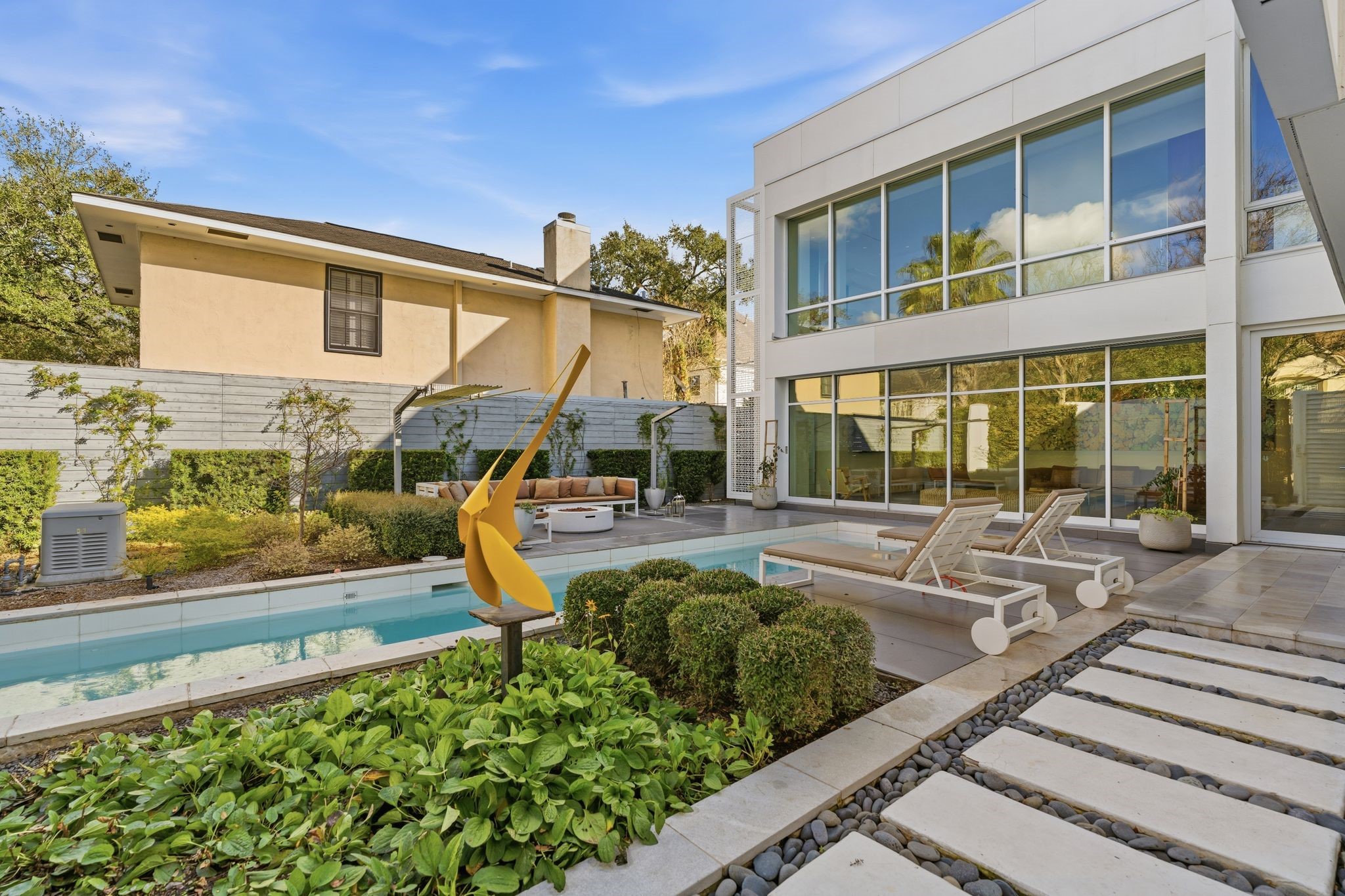 1509 Banks Street Houston, TX 77006 - Photo 33 of 40 a view of a house with backyard sitting area and swimming pool