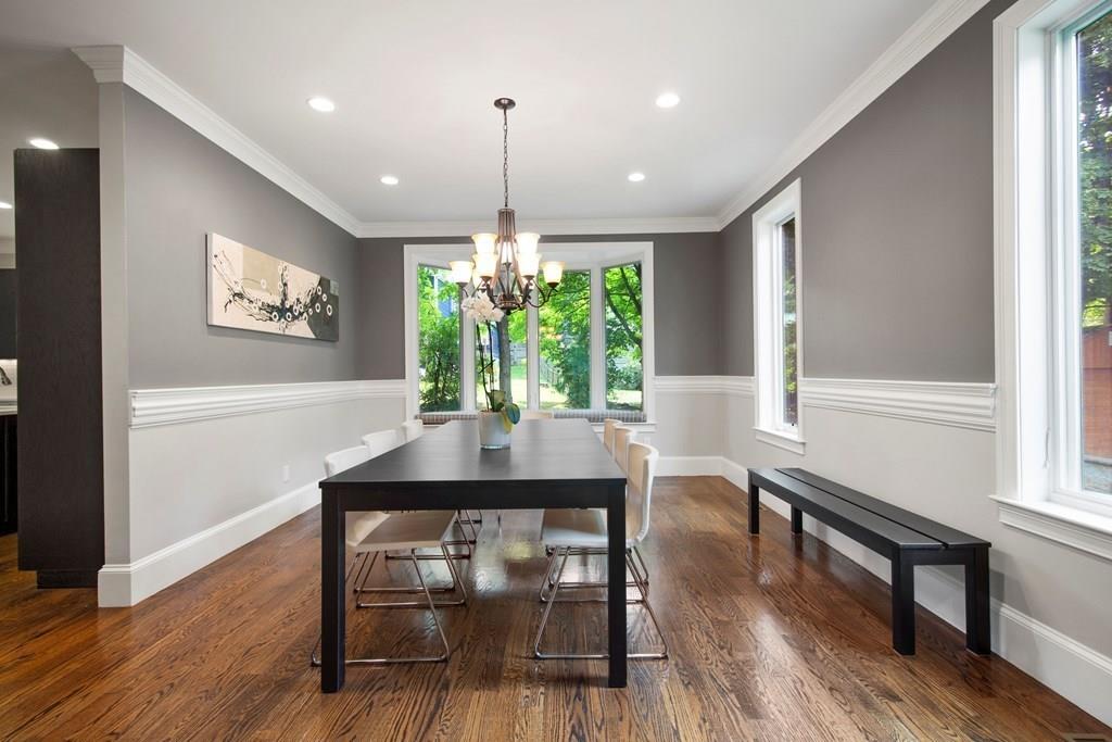 45 Village Circle Newton, MA 02459 - Photo 8 of 18 a view of a dining room with furniture window and wooden floor