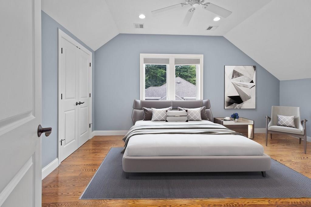45 Village Circle Newton, MA 02459 - Photo 9 of 18 a bedroom with a large bed and a window