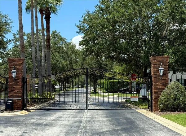 an aerial view of houses with outdoor space