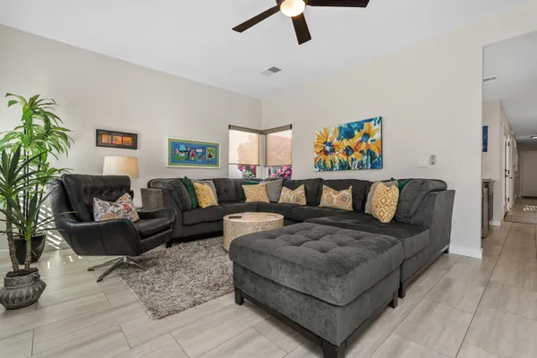 a living room with furniture and a couch