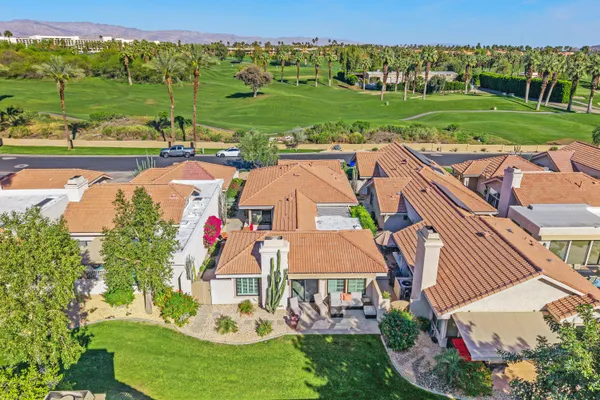 an aerial view of a house with garden