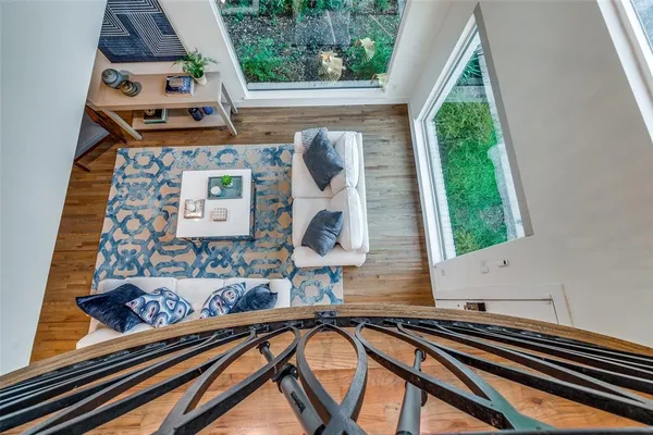 a picture of a room that has a table and chair