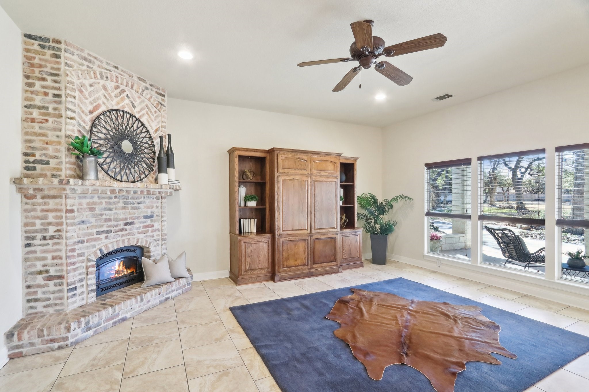 294 Logan Ranch Road Georgetown, TX 78628 - Photo 12 of 40 a living room with furniture and a fireplace