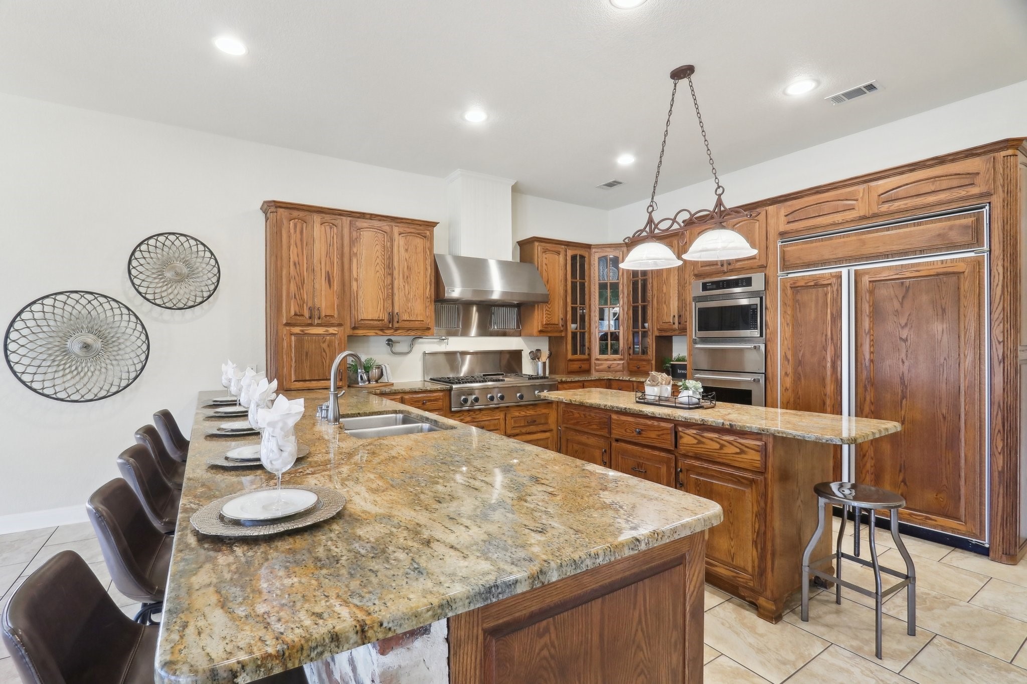 294 Logan Ranch Road Georgetown, TX 78628 - Photo 10 of 40 a large kitchen with a table and chairs