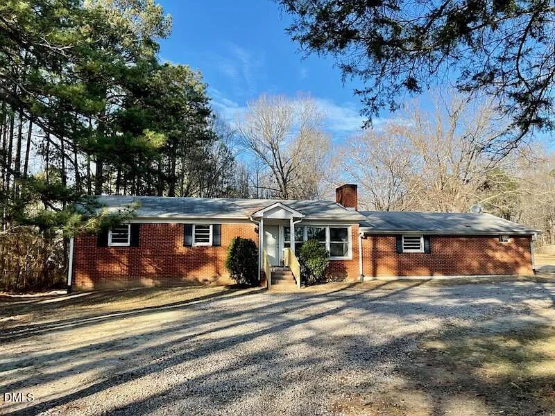 front view of a house with a street