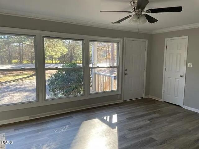7 Noble Road Franklinton, NC 27525 - Photo 6 of 8 a view of an empty room with wooden floor and window