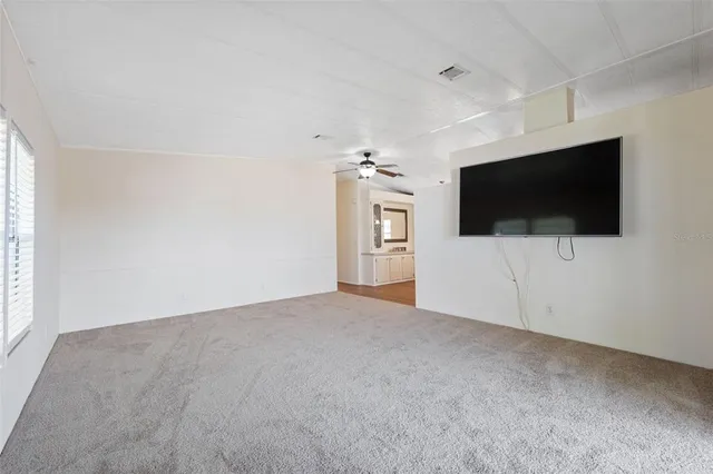 a view of a livingroom with a flat screen tv