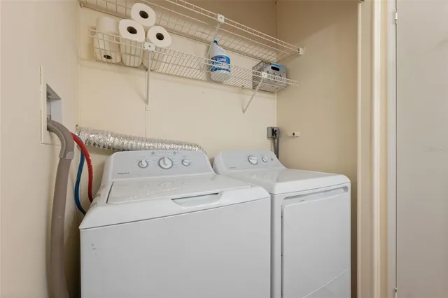a utility room with dryer and washer
