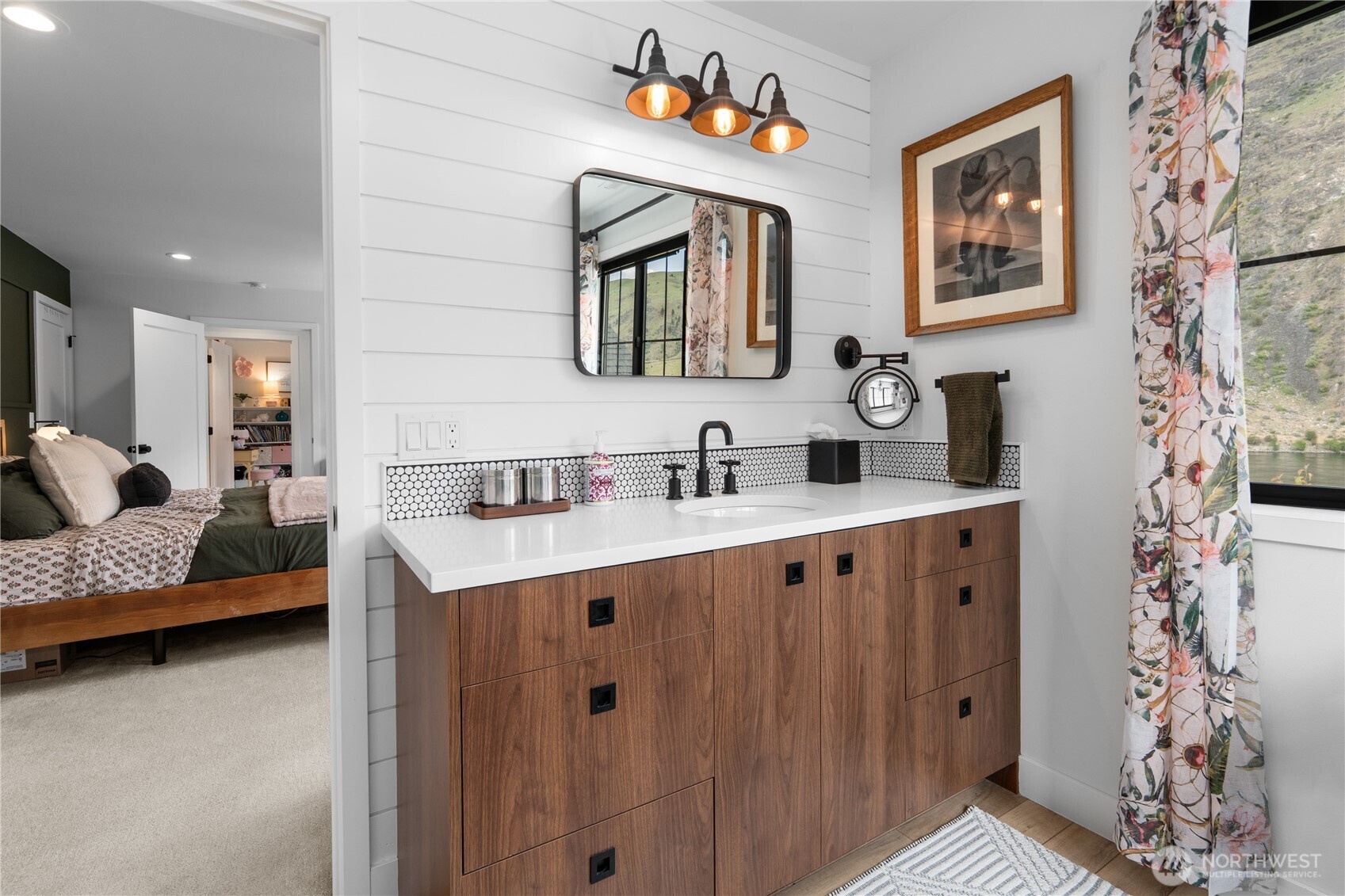 485 Hidden Lane Chelan, WA 98816 - Photo 26 of 40 a bathroom with double vanity sink and a mirror