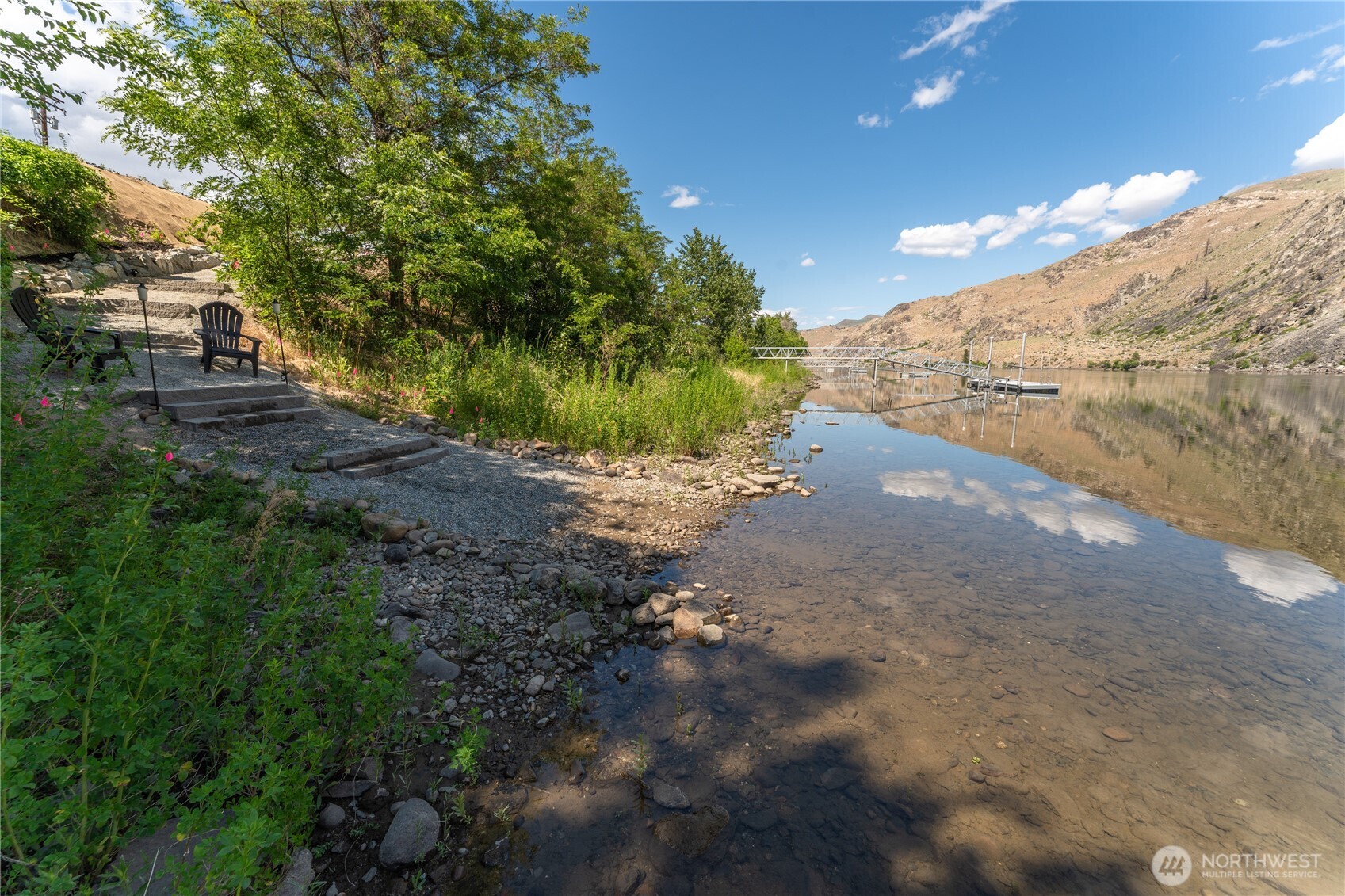 485 Hidden Lane Chelan, WA 98816 - Photo 33 of 40 a view of a yard with a tree