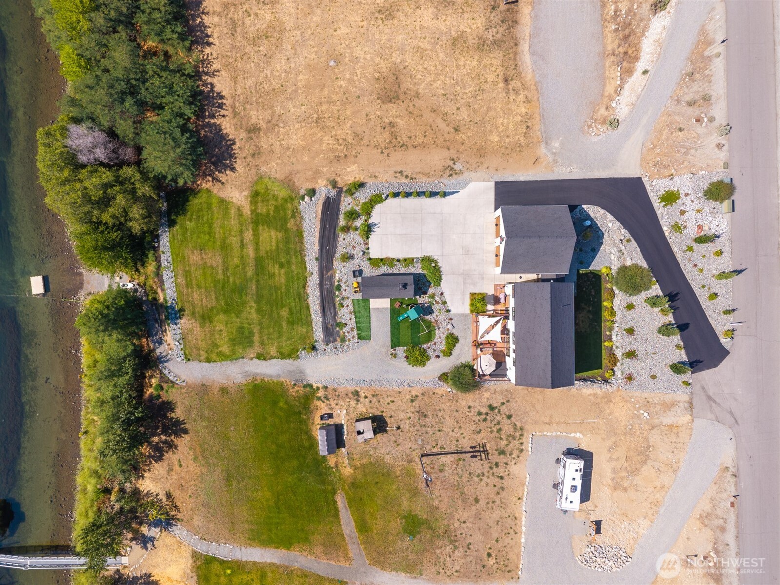 485 Hidden Lane Chelan, WA 98816 - Photo 35 of 40 an aerial view of a house with swimming pool