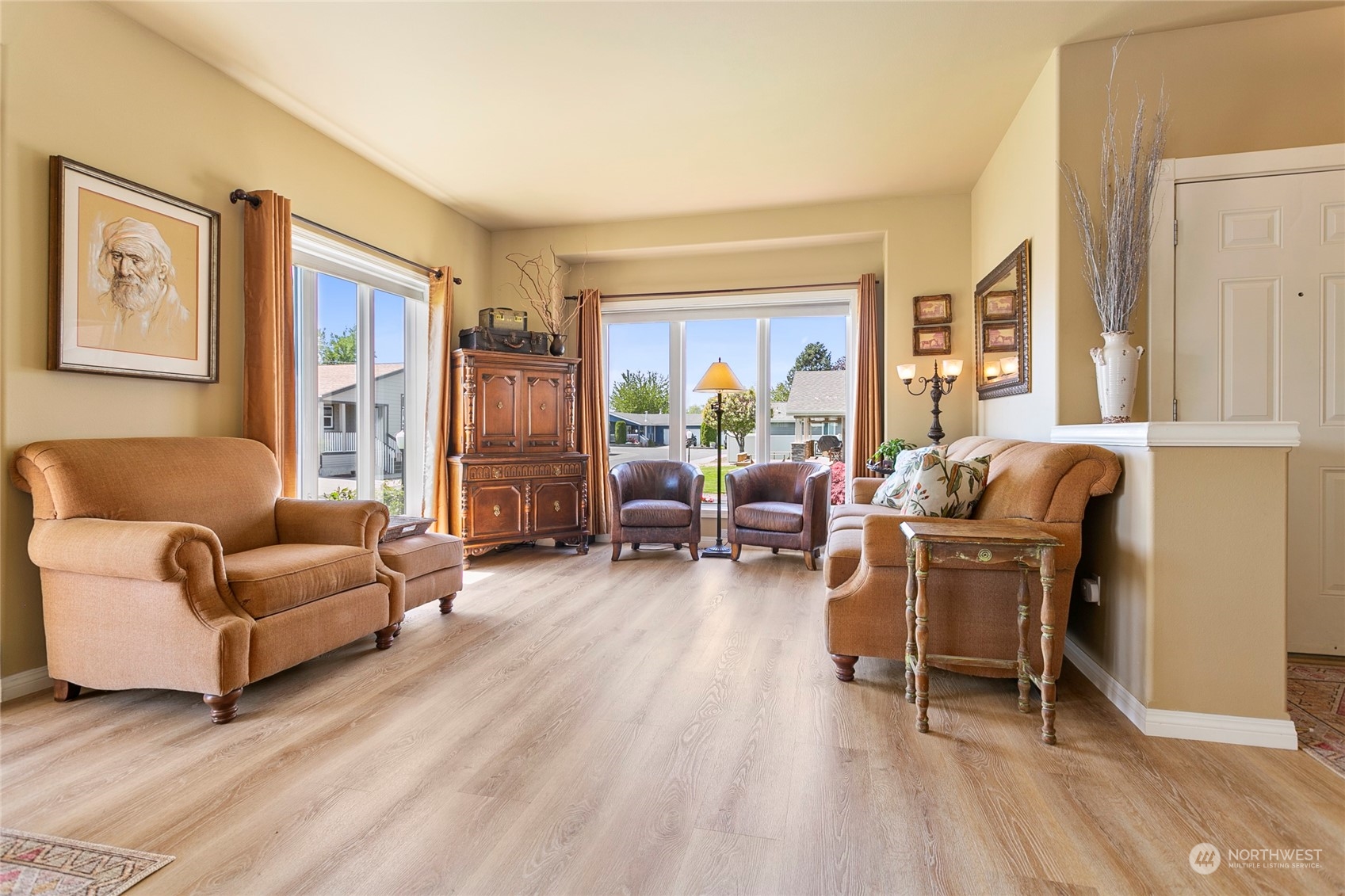 107 South Pass Road, Unit 32 Nooksack, WA 98276 - Photo 11 of 40 a living room with furniture and a wooden floor