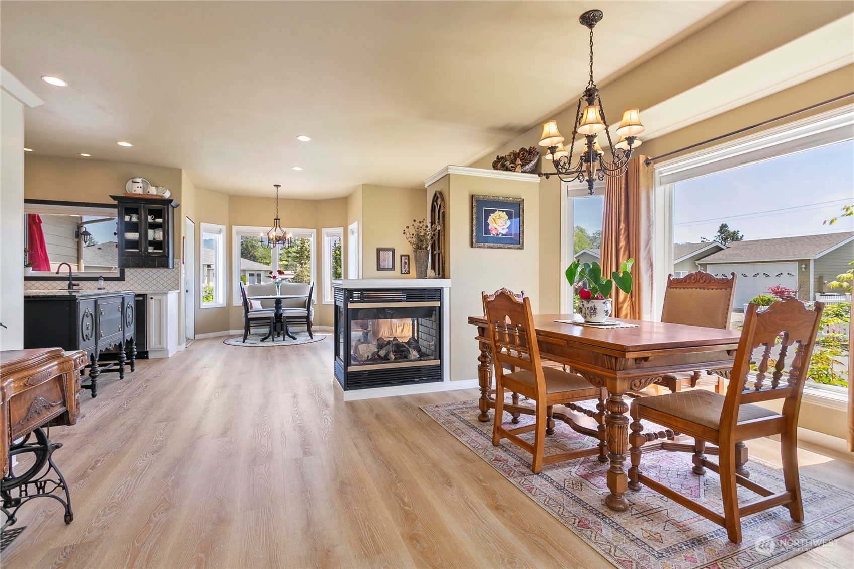 107 South Pass Road, Unit 32 Nooksack, WA 98276 - Photo 13 of 40 a view of a dining room with furniture window and wooden floor
