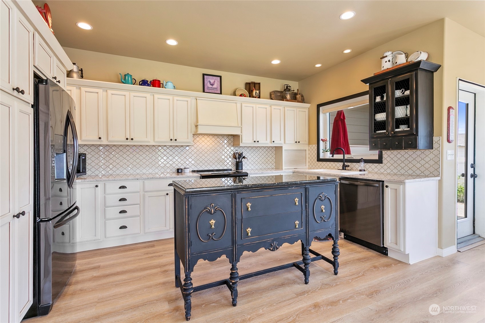 107 South Pass Road, Unit 32 Nooksack, WA 98276 - Photo 18 of 40 a kitchen with a refrigerator cabinets and wooden floor