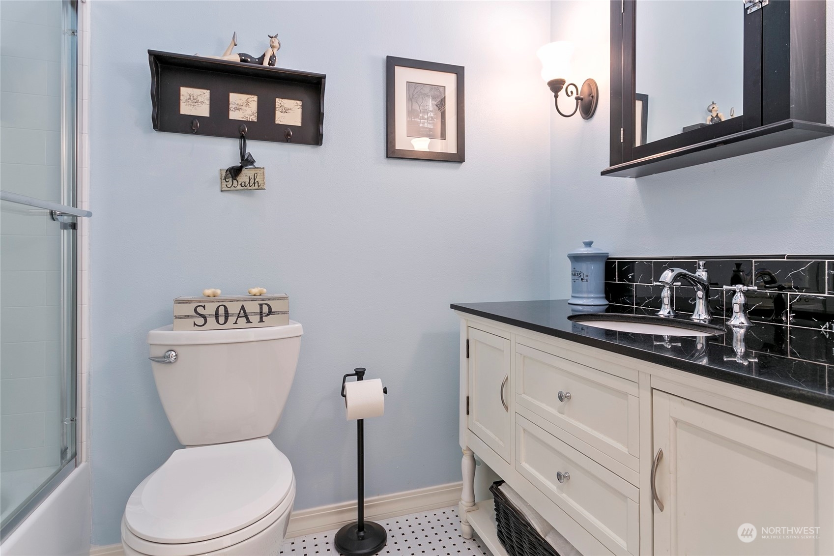 107 South Pass Road, Unit 32 Nooksack, WA 98276 - Photo 30 of 40 a bathroom with a toilet a sink and mirror