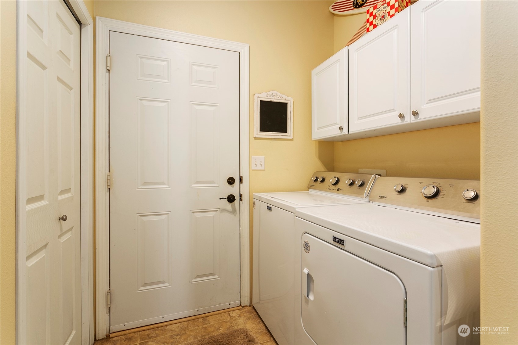 107 South Pass Road, Unit 32 Nooksack, WA 98276 - Photo 31 of 40 a view of storage and utility room with a washer and dryer