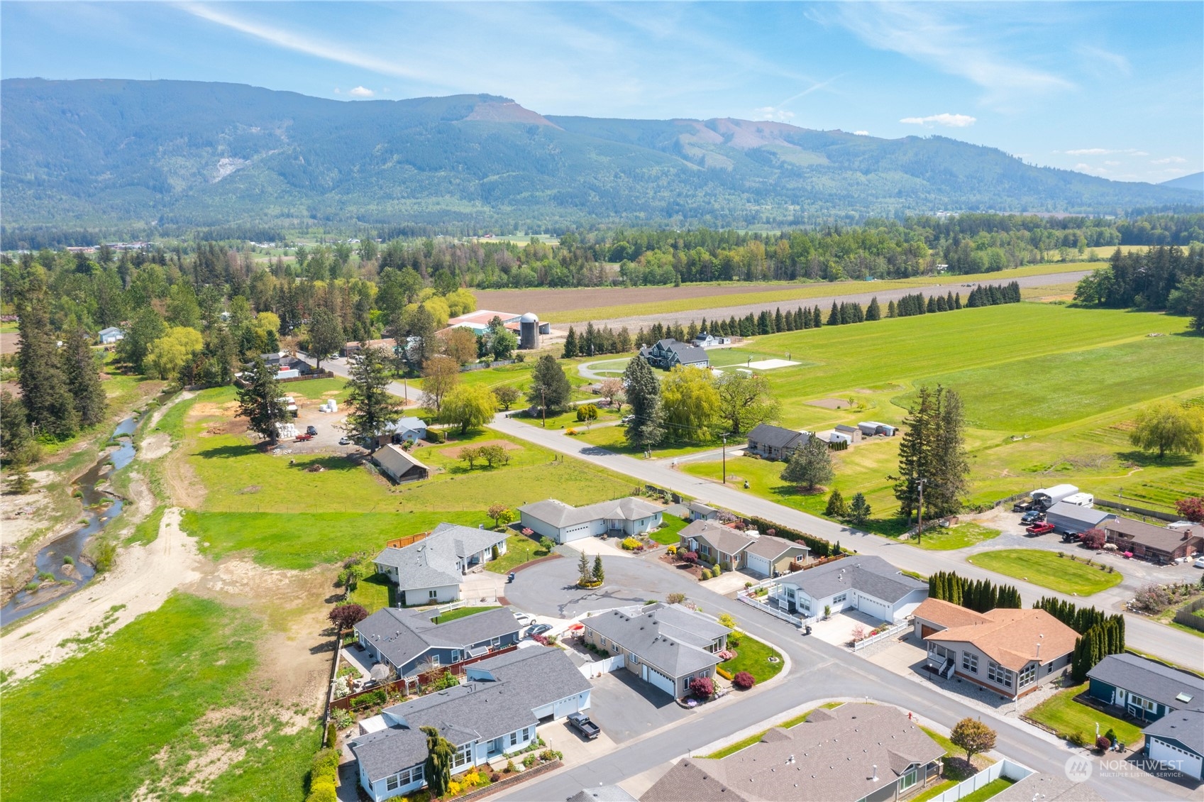 107 South Pass Road, Unit 32 Nooksack, WA 98276 - Photo 7 of 40 a view of a city with an ocean