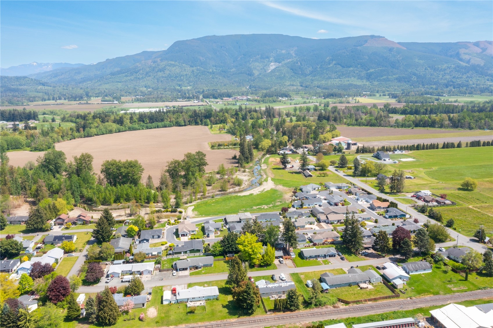 107 South Pass Road, Unit 32 Nooksack, WA 98276 - Photo 8 of 40 a view of a city with mountains in the background