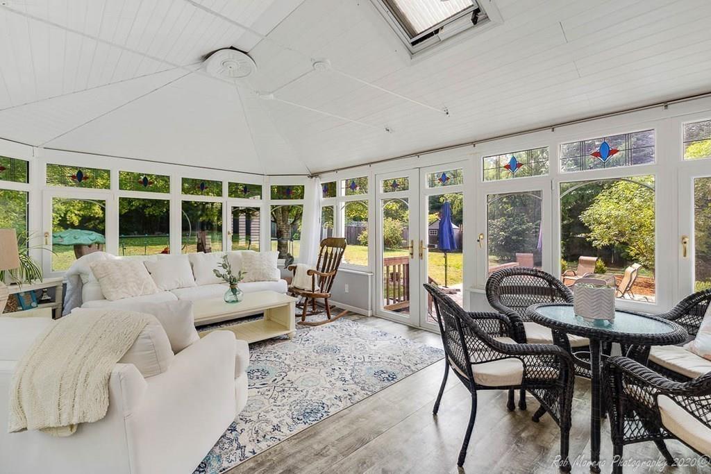 324 Linebrook Road Ipswich, MA 01938 - Photo 15 of 39 a living room with furniture and large windows