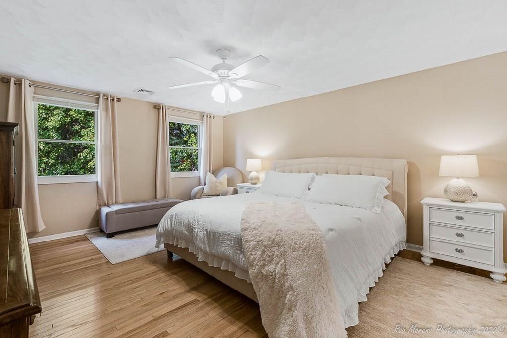 324 Linebrook Road Ipswich, MA 01938 - Photo 20 of 39 a bedroom with bed and window