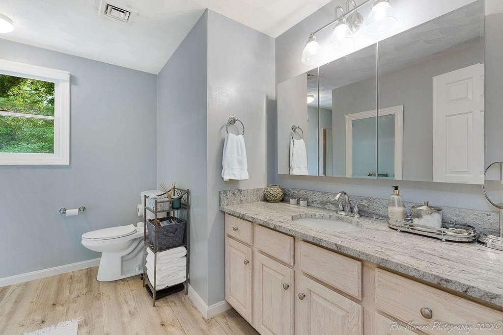 324 Linebrook Road Ipswich, MA 01938 - Photo 22 of 39 a bathroom with a granite countertop sink and a mirror