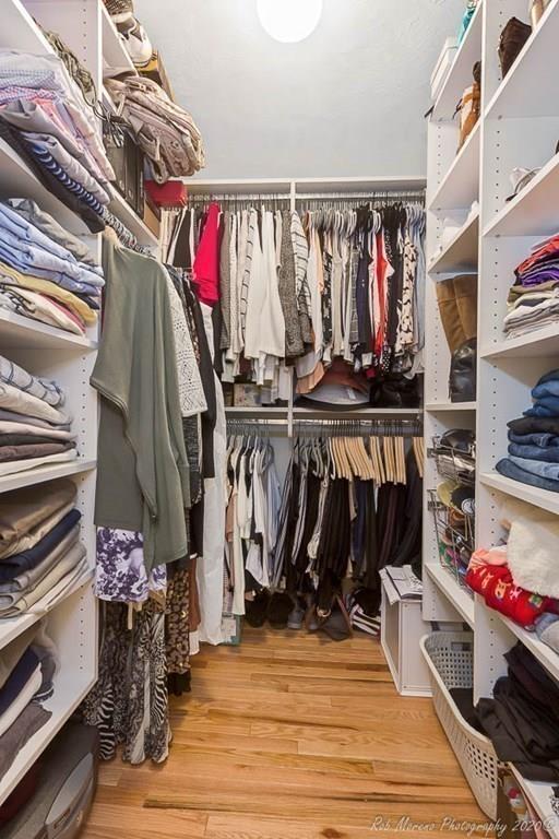 324 Linebrook Road Ipswich, MA 01938 - Photo 23 of 39 a view of walk in closet with clothes and shoes