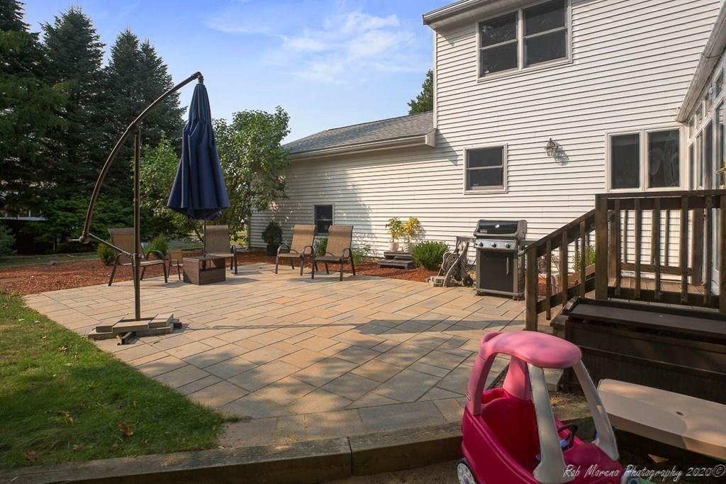 324 Linebrook Road Ipswich, MA 01938 - Photo 30 of 39 a swimming pool with some trees in the background