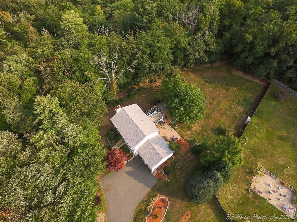 324 Linebrook Road Ipswich, MA 01938 - Photo 36 of 39 an aerial view of a house with a yard