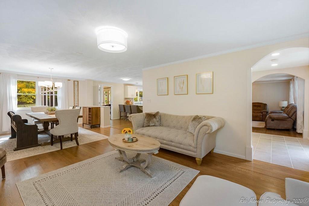 324 Linebrook Road Ipswich, MA 01938 - Photo 6 of 39 a living room with furniture and a large window