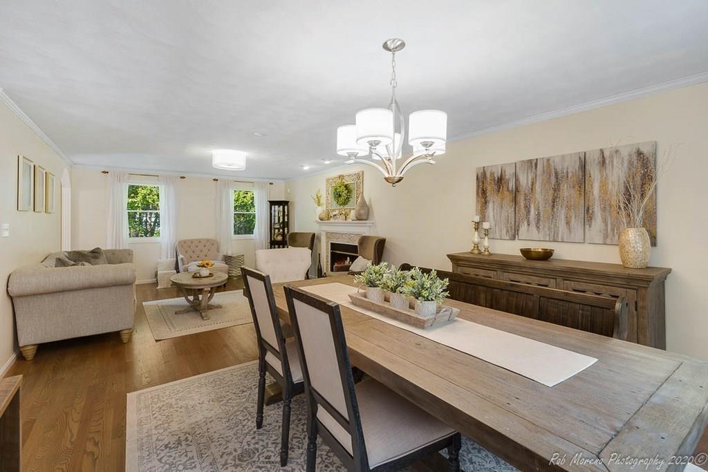 324 Linebrook Road Ipswich, MA 01938 - Photo 9 of 39 a view of a dining room with furniture and wooden floor