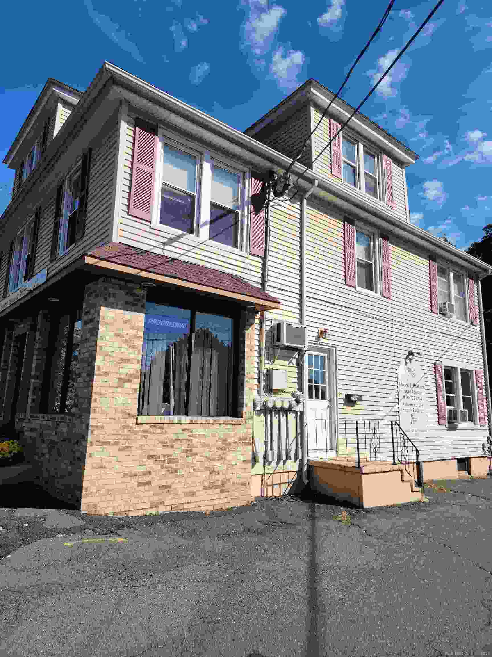 136 Broad Street Plainville, CT 06062 - Photo 1 of 10 a view of a house with a street