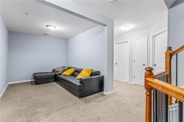 a bedroom with furniture and window