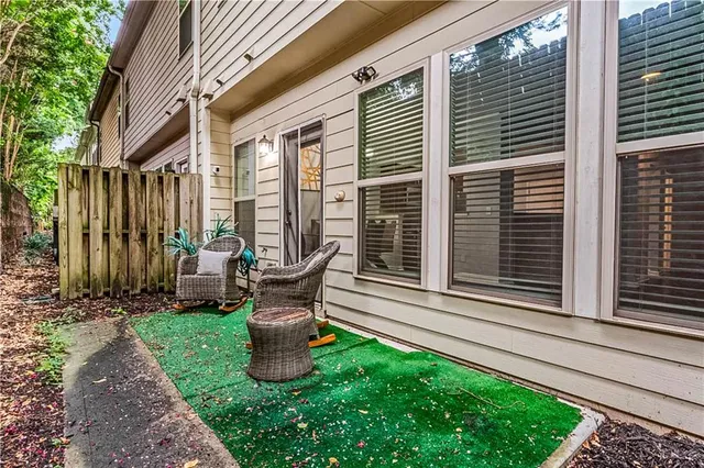 a view of an entryway with wooden floor and stairs