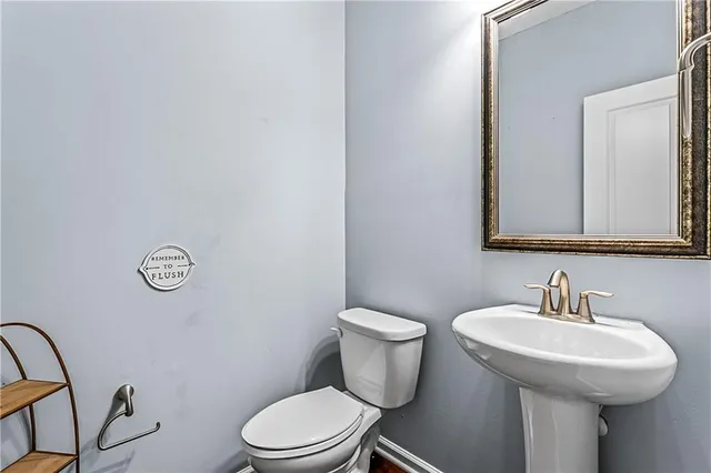 a kitchen with a refrigerator a stove top oven a sink and dishwasher