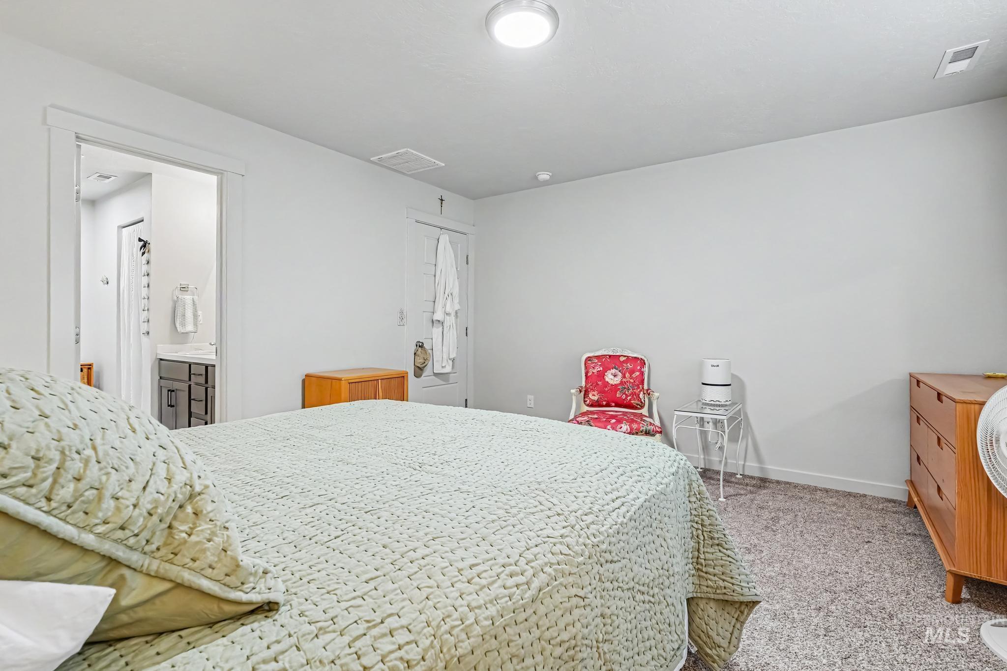 238 West Riggs Spring Avenue Meridian, ID 83642 - Photo 11 of 16 Carpeted flooring with a contrasting white wall finish