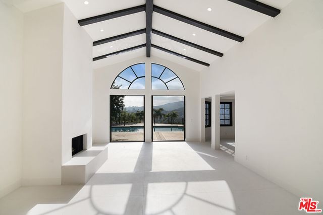 a view of entryway with a front door