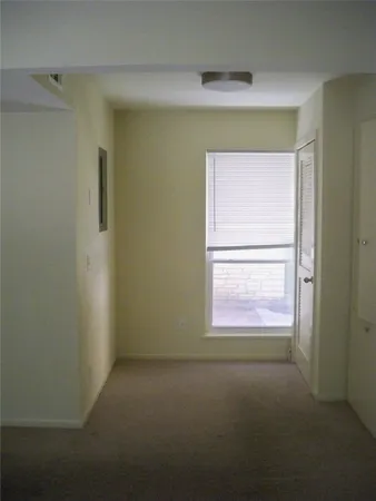 a view of a small space with a window