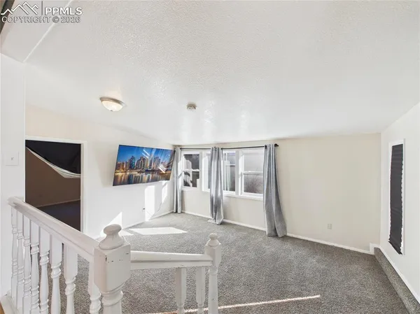 a view of front door with hallway
