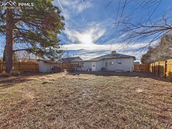 a house view with a backyard
