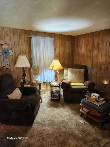 a living room with furniture and a couch